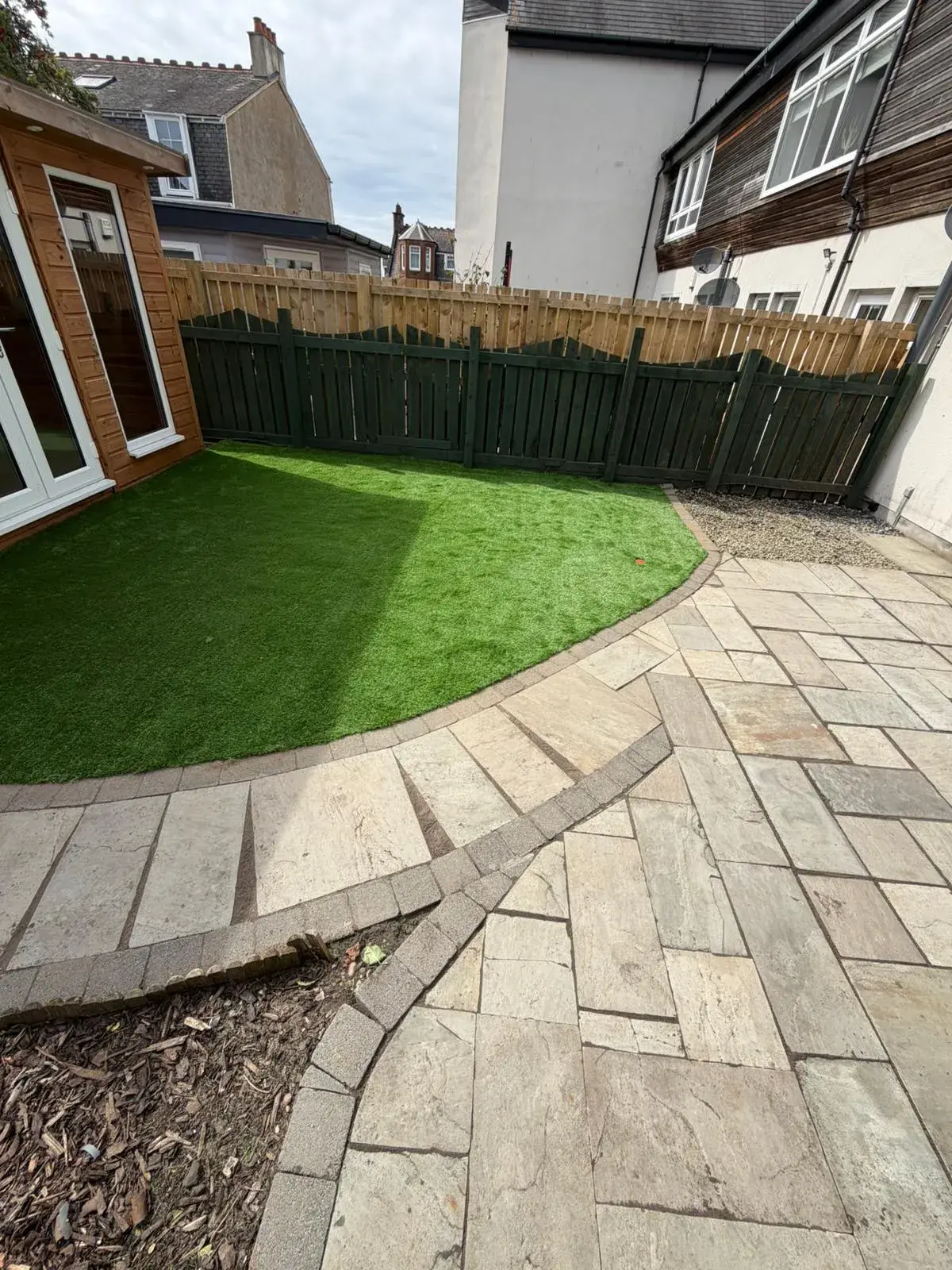 Landscaped garden with artificial lawn